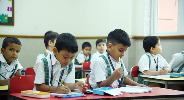 students studying at first school meral